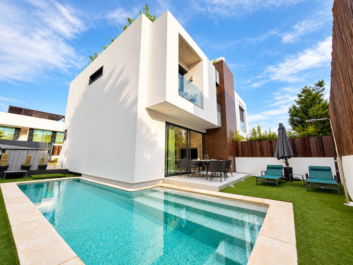 Modern townhouse with rooftop terrace and sea views in Ses Torres.