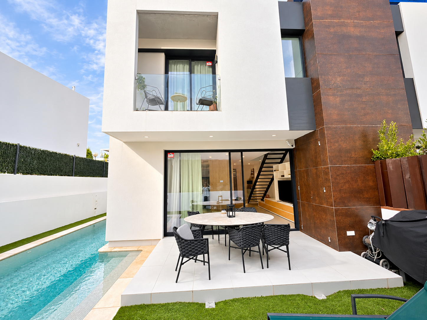 Modern townhouse with rooftop terrace and sea views in Ses Torres.